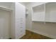 Spacious walk-in closet with custom shelving and ample storage space at 1655 Rosebud Ln, Greenwood, IN 46143
