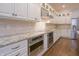 Modern kitchen showcasing granite counters, stainless appliances, and ample cabinet space at 1655 Rosebud Ln, Greenwood, IN 46143
