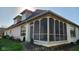 Charming white brick home featuring an inviting screened-in porch perfect for outdoor living at 1655 Rosebud Ln, Greenwood, IN 46143