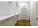Spacious walk-in closet features custom shelving, providing ample storage and organization solutions at 1655 Rosebud Ln, Greenwood, IN 46143