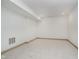 Bright, carpeted basement with neutral walls and flooring, ideal for customization and ample space at 1818 Central Ave, Indianapolis, IN 46202