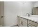 This bathroom includes a sink, stone countertop, mirror, vanity, and gold hardware at 1818 Central Ave, Indianapolis, IN 46202