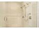 This bathroom features a walk-in shower with tiled walls, glass door and dual shower heads at 1818 Central Ave, Indianapolis, IN 46202
