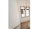 Well-lit stairwell with large windows and modern lighting fixture at 1818 Central Ave, Indianapolis, IN 46202