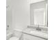 Bathroom featuring white vanity, a modern sink, and a combination tub and shower at 2004 Foothill Dr, Greenfield, IN 46140