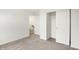 Bright bedroom with neutral carpet and closet at 2004 Foothill Dr, Greenfield, IN 46140