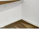 Walk-in closet with carpet, base trim, and wire shelf at 2004 Foothill Dr, Greenfield, IN 46140