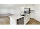 The kitchen features a big island and stainless steel appliances at 2004 Foothill Dr, Greenfield, IN 46140