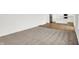 Open floor plan with carpet and a view of the kitchen with hard surface floors at 2004 Foothill Dr, Greenfield, IN 46140