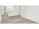 Open loft area with neutral carpet and white walls leading to several doorways at 2004 Foothill Dr, Greenfield, IN 46140