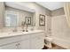 The bathroom offers a double vanity with modern fixtures and stylish decor and a shower and toilet at 2134 Boxwood Dr, Greenfield, IN 46140