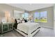 Sunlit bedroom with a large window, a modern desk, and cozy decor creates a peaceful retreat at 2134 Boxwood Dr, Greenfield, IN 46140