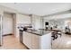Spacious kitchen featuring an island with seating, stainless steel appliances, and an open layout with dining and living areas at 2134 Boxwood Dr, Greenfield, IN 46140