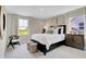 A bedroom with natural light, a large window, and neutral tones to promote a relaxing atmosphere at 2134 Boxwood Dr, Greenfield, IN 46140