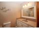 Bathroom with a modern sink, vanity, lighting, and decorative wall art at 2566 S Ritter Ave, Indianapolis, IN 46203
