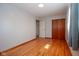 Hardwood floors accent this cozy bedroom with natural light at 2566 S Ritter Ave, Indianapolis, IN 46203