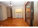 Open living area showcasing hardwood floors, a closet, and patio access with laundry at 2566 S Ritter Ave, Indianapolis, IN 46203