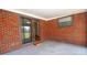 Brick patio with outdoor access through sliding glass door, offering great space at 2566 S Ritter Ave, Indianapolis, IN 46203