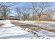 Long, winding driveway leading up to a home surrounded by bare trees at 2843 E 236Th St, Cicero, IN 46034