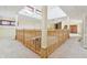 Second story landing with wooden banister and skylight at 2843 E 236Th St, Cicero, IN 46034