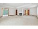 Spacious living room featuring a fireplace and multiple entryways at 2843 E 236Th St, Cicero, IN 46034