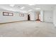 Bright living room with skylights, neutral walls, and multiple doorways at 2843 E 236Th St, Cicero, IN 46034