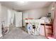 bedroom featuring a bunk bed with a play area underneath and carpet floors at 2962 Station St, Indianapolis, IN 46218