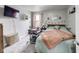 Bedroom showcasing a cozy bed, soft lighting, and a bassinet for a Bedroom setup at 2962 Station St, Indianapolis, IN 46218