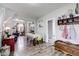Open-concept dining room with hardwood floors and a seamless flow to the living spaces at 2962 Station St, Indianapolis, IN 46218