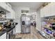 Well-equipped kitchen featuring modern appliances and adjacent access to the living spaces at 2962 Station St, Indianapolis, IN 46218
