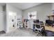 playroom featuring a play kitchen, storage shelves, and a view to a partial bathroom at 2962 Station St, Indianapolis, IN 46218