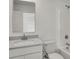 Bathroom featuring a sink vanity and shower with white tile and hardware at 2996 Grand Ridge Dr, Greenwood, IN 46143