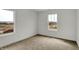 Bedroom featuring neutral carpet and a window with neighborhood view at 2996 Grand Ridge Dr, Greenwood, IN 46143