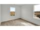 Bedroom with natural light, neutral carpet, and white trim at 2996 Grand Ridge Dr, Greenwood, IN 46143
