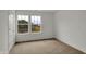 Bright bedroom with neutral carpet, white walls, and natural light from the window at 2996 Grand Ridge Dr, Greenwood, IN 46143