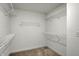 Walk-in closet with multiple racks for ample storage space at 2996 Grand Ridge Dr, Greenwood, IN 46143