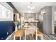 Eat-in kitchen showing dining room area with stainless steel appliances at 3549 Woodale Rd, Indianapolis, IN 46234