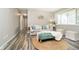 Well-lit living room features hardwood floors and a comfortable sofa at 3549 Woodale Rd, Indianapolis, IN 46234