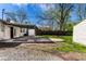 Backyard with patio, shed, and gravel at 3944 Strathmore Dr, Indianapolis, IN 46235