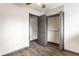 Bedroom with closet space with doors and modern neutral finishes at 3944 Strathmore Dr, Indianapolis, IN 46235
