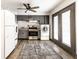 Functional kitchen with grey cabinets, stainless steel appliances, and nearby washer and dryer at 3944 Strathmore Dr, Indianapolis, IN 46235