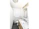 This bathroom features a modern vanity with marble countertop and stainless steel hardware at 401 W Westfield Blvd, Indianapolis, IN 46208