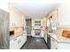 Stylish kitchen with stainless steel appliances, white cabinets, and granite countertops for a modern feel at 401 W Westfield Blvd, Indianapolis, IN 46208