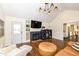 Bright living room with fireplace, TV and modern lighting at 401 W Westfield Blvd, Indianapolis, IN 46208