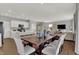 Bright dining space open to the kitchen and living areas, perfect for entertaining and Gathering meals at 4040 Jacoby Pl, Indianapolis, IN 46268