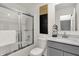 Well-lit bathroom with a shower, tub, and sleek vanity at 4046 Jacoby Pl, Indianapolis, IN 46268