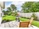 Backyard patio area showing an outdoor grill and a pair of chairs at 4501 N Wheeling Ave # 10A-101, Muncie, IN 47304