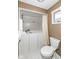 Bathroom features a walk-in tub, modern fixtures, and white cabinets at 4501 N Wheeling Ave # 10A-101, Muncie, IN 47304