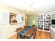 Stylish dining area with hardwood floors and built-in shelving at 4501 N Wheeling Ave # 10A-101, Muncie, IN 47304