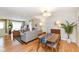 Comfortable living and dining area with hardwood floors and natural light at 4501 N Wheeling Ave # 10A-101, Muncie, IN 47304